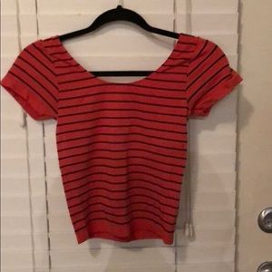 Orange and blue striped crop T-shirt.